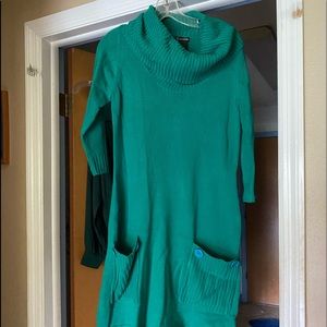 Sweater dress with a cow neck, 3/4 sleeves. Been folded up in my closet